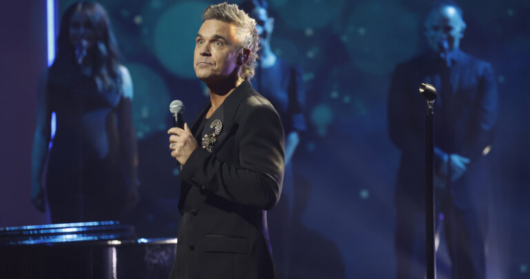 Nagy a találgatás a Glastonbury fesztivál titkos fellépőjének személye körül, Robbie Williams is megszólalt